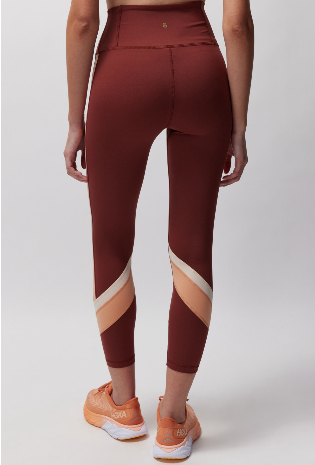 Vista trasera del Legging marrón con rayas naranjas y beige de Spiritual Gangster, talla S, 50% OFF.