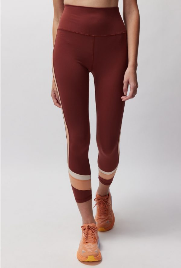 Legging marrón con rayas naranjas y beige de Spiritual Gangster, talla S, 50% OFF, vista frontal completa.